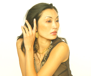 Female model photo shoot of NinaBasharovaJewelry by J.D. Marks