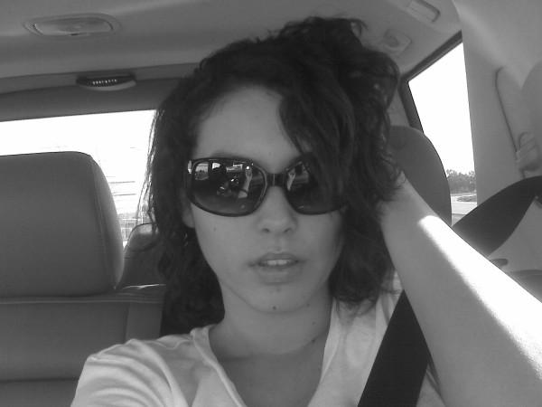 Female model photo shoot of Lo Nichols in Salinas, in my car.