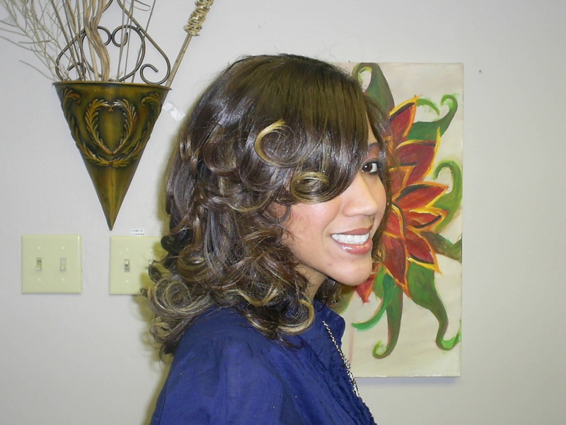 Female model photo shoot of Jerrilynn in Tangles Hair Salon