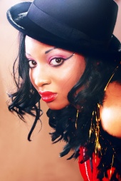 Female model photo shoot of Afrikana in Chicago IL, makeup by Princess Kaillez