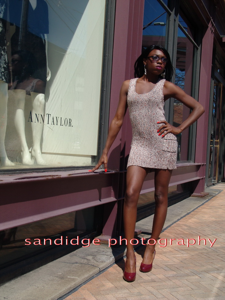 Female model photo shoot of Mrs CoCo by Sandidge Photography in city scene