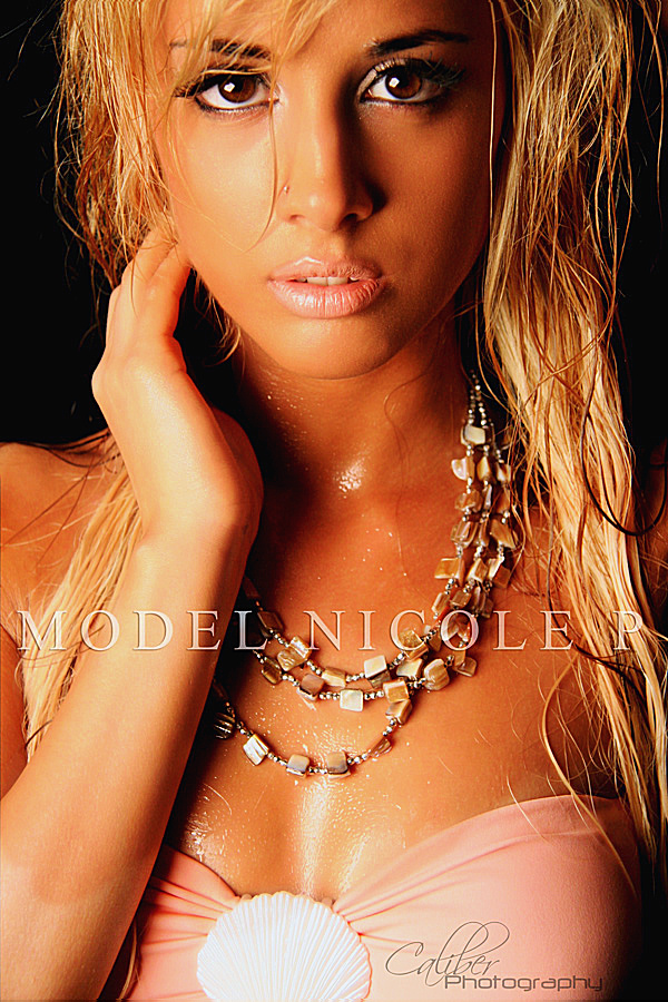 Female model photo shoot of Nicole Pietrontone in studio