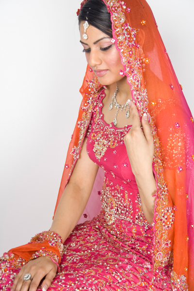 Female model photo shoot of Kiran R by Tom Hart Photography in Birmingham, makeup by Sonila Ellahi