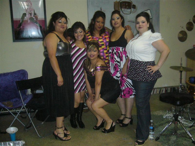Female model photo shoot of Enchanted Curves by gg in Landing Party  Fashion Show..Apr 11,09