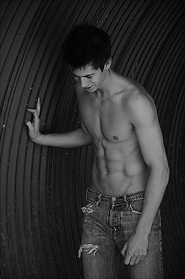 Male model photo shoot of Austin David Schott in Tunnel