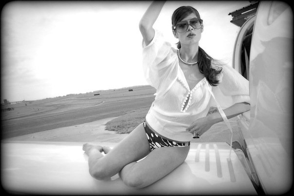 Female model photo shoot of Angela Boudreaux in Lake Front Airport New Orleans