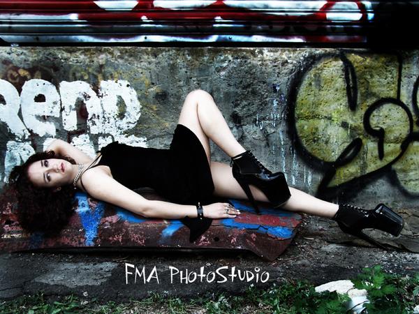 Female model photo shoot of Pistol Wyld