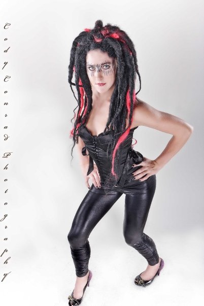 Female model photo shoot of WarPaint Hair and Model Manda by cody conrad