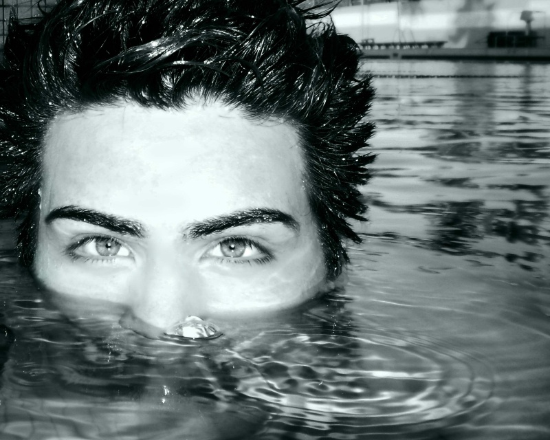 Male model photo shoot of Horacio Ivan Sanchez in Ventura College Aquatic Center 