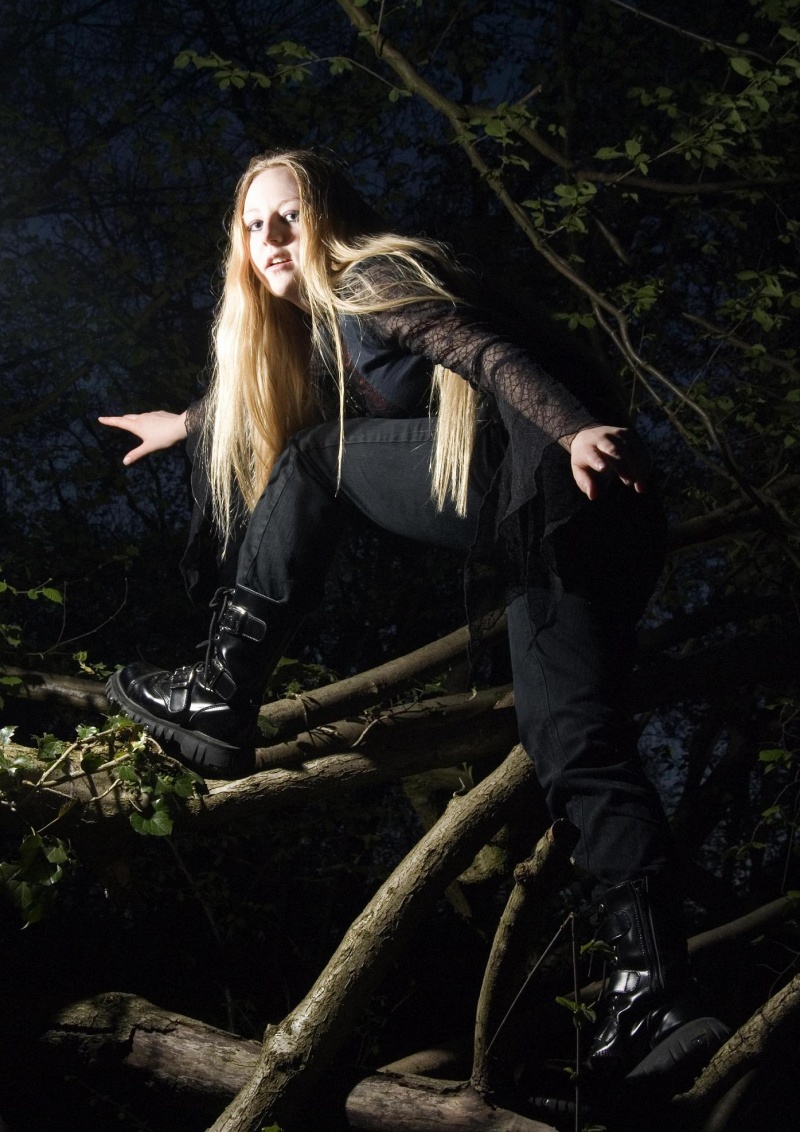 Female model photo shoot of Midnight Wolf by D4Photography in Woods- Hampshire