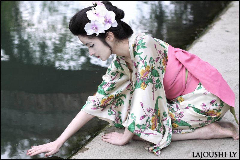 Female model photo shoot of Lajoushi Ly and Shadows Land