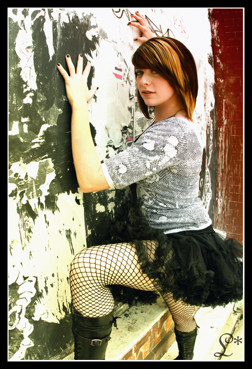 Female model photo shoot of photographic-visions and Anomaly De Void in Downtown Ybor