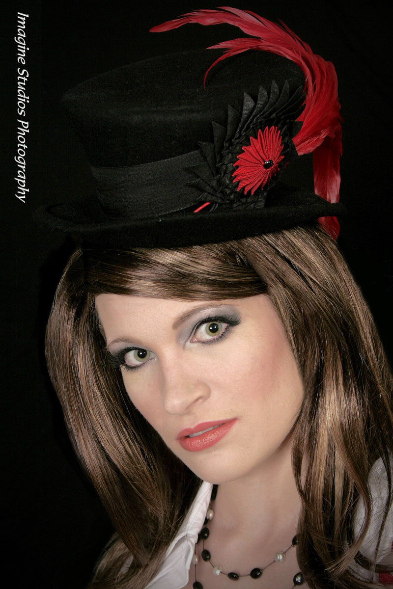 Female model photo shoot of KissCurl Millinery and Jaclyn Michelle by J A Bender, clothing designed by KissCurl Millinery