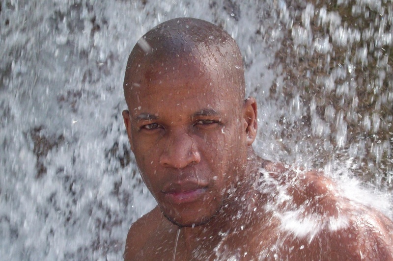 Male model photo shoot of Ovante in Dunns River Fall Jamaica