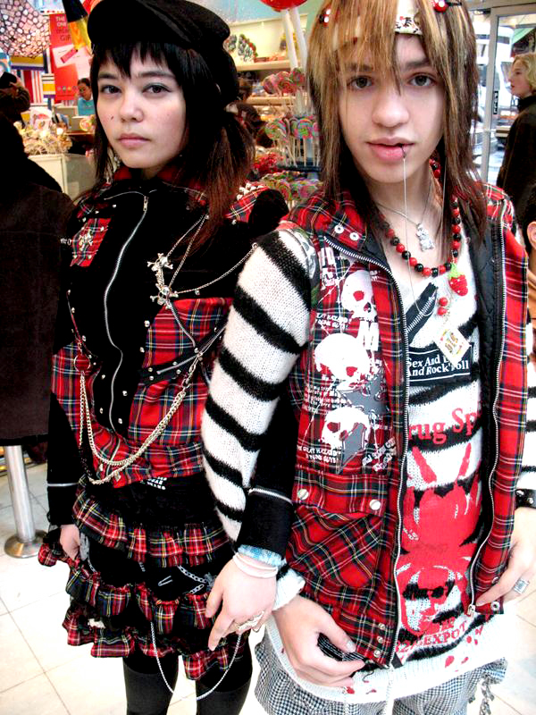 Female and Male model photo shoot of LilHevn , Kei ko and Orchidae in Candy shop