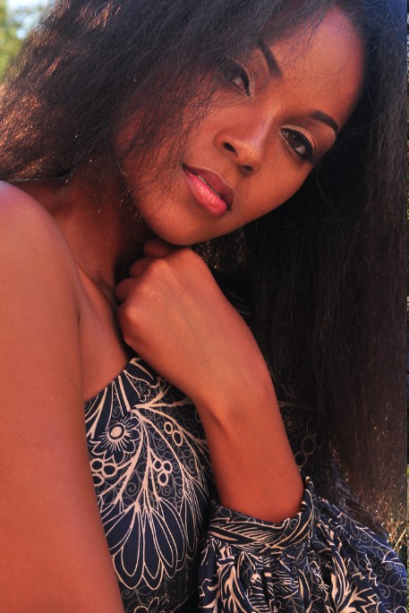Female model photo shoot of Shequita by c w, makeup by PAINTED BY JEREMY