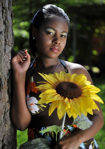 Female model photo shoot of Portia Turman by JandD Images, makeup by AlluringArtsByAntrice