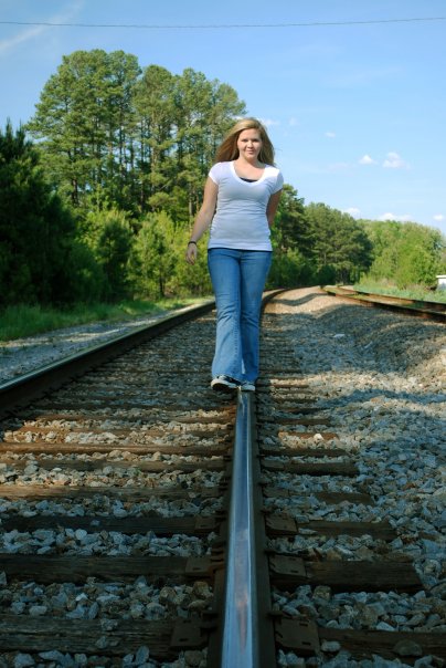 Female model photo shoot of Hailey Beth in Train Tracks 