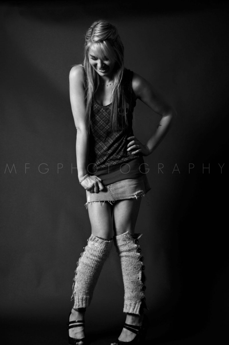 Female model photo shoot of starlettestars by MFG Photography in MFG Photography studio 