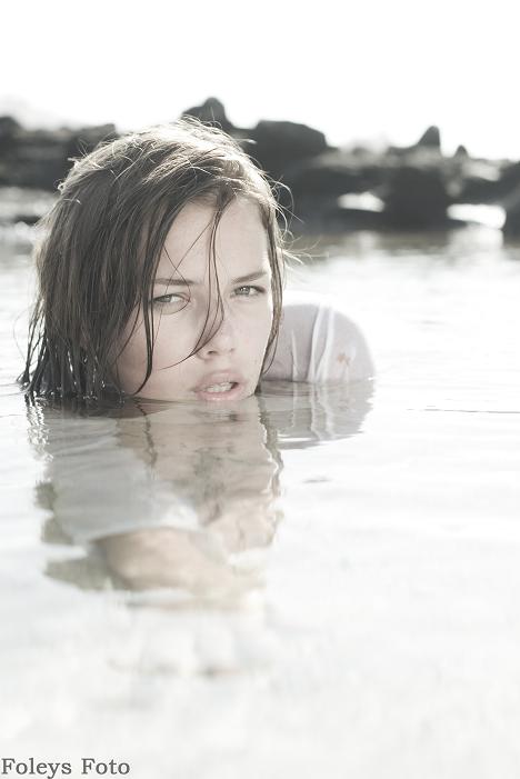 Female model photo shoot of emilie rose in sandy beach, honolulu