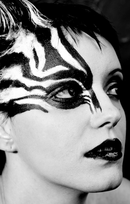 Female model photo shoot of LK Makeup FX in East Texas Exotic Animal Farm