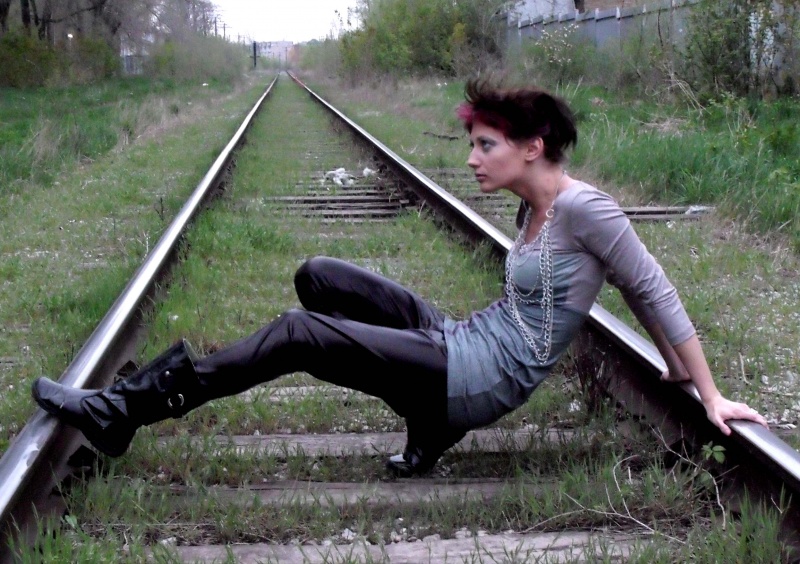 Female model photo shoot of Dutch Darling in toronto landsdowne train tracks