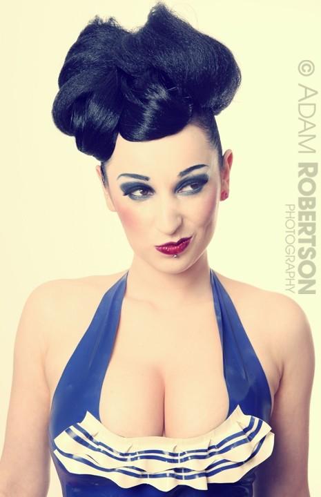 Female model photo shoot of Estastar, makeup by Rebecca Seal-Davis MUA, clothing designed by Kaoris Latex Dreams