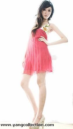 Female model photo shoot of Michelle Ashlee, clothing designed by YANG Singapore