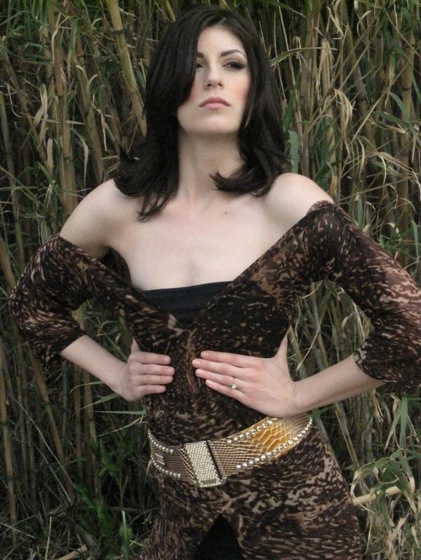 Female model photo shoot of KaylaNecole in Riverside CA, clothing designed by LandoCouture