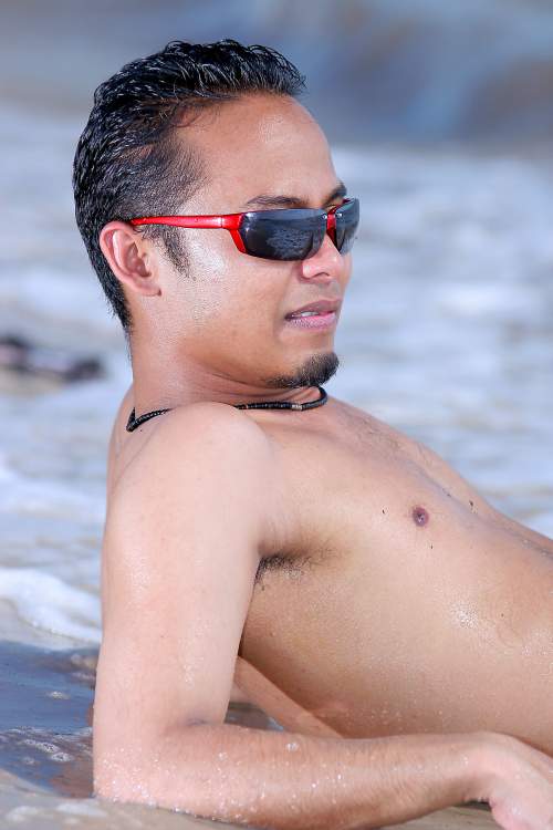 Male model photo shoot of rolanDHashim in Bagan Lalang Beach, Selangor, Malaysia
