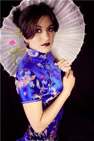 Female model photo shoot of Rohirrim by Laura Anderson Photo in Sacred Skin's Studio