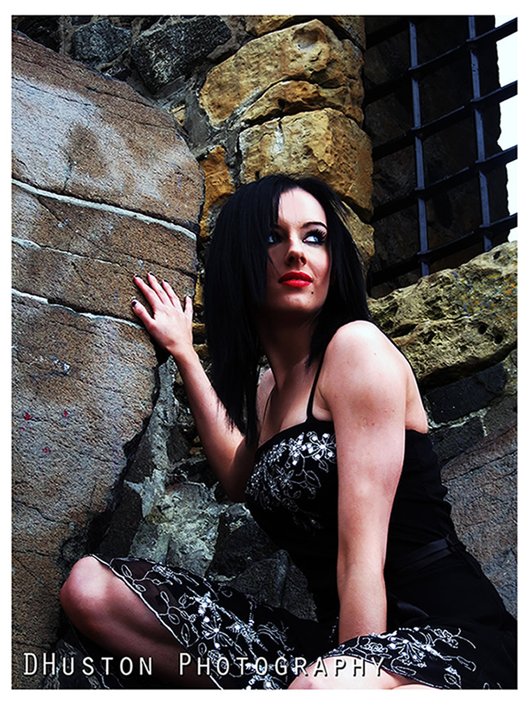 Female model photo shoot of Lauryn Hall in carrickfergus castle