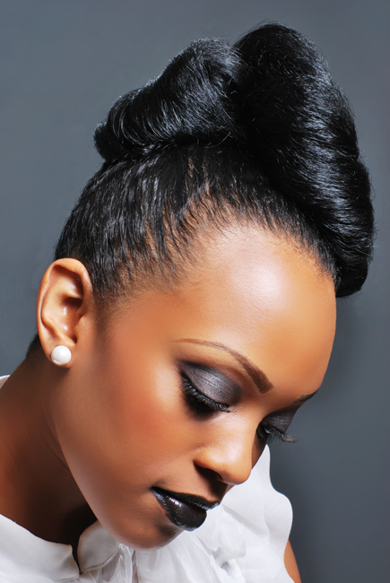 Female model photo shoot of Hair Designs by Ajani Truth