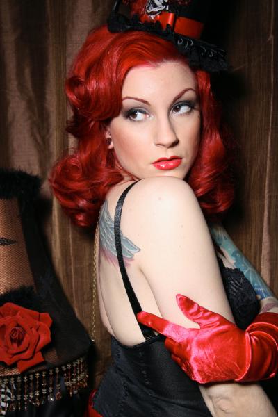 Female model photo shoot of Cherry Cat Hair