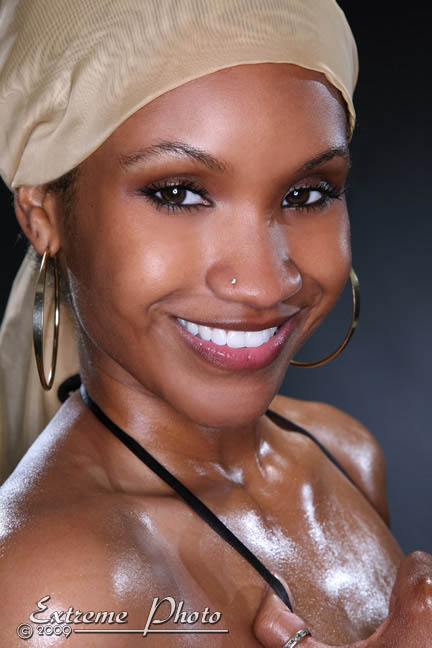 Female model photo shoot of Menika by Extreme Photo in West Des Moines Iowa