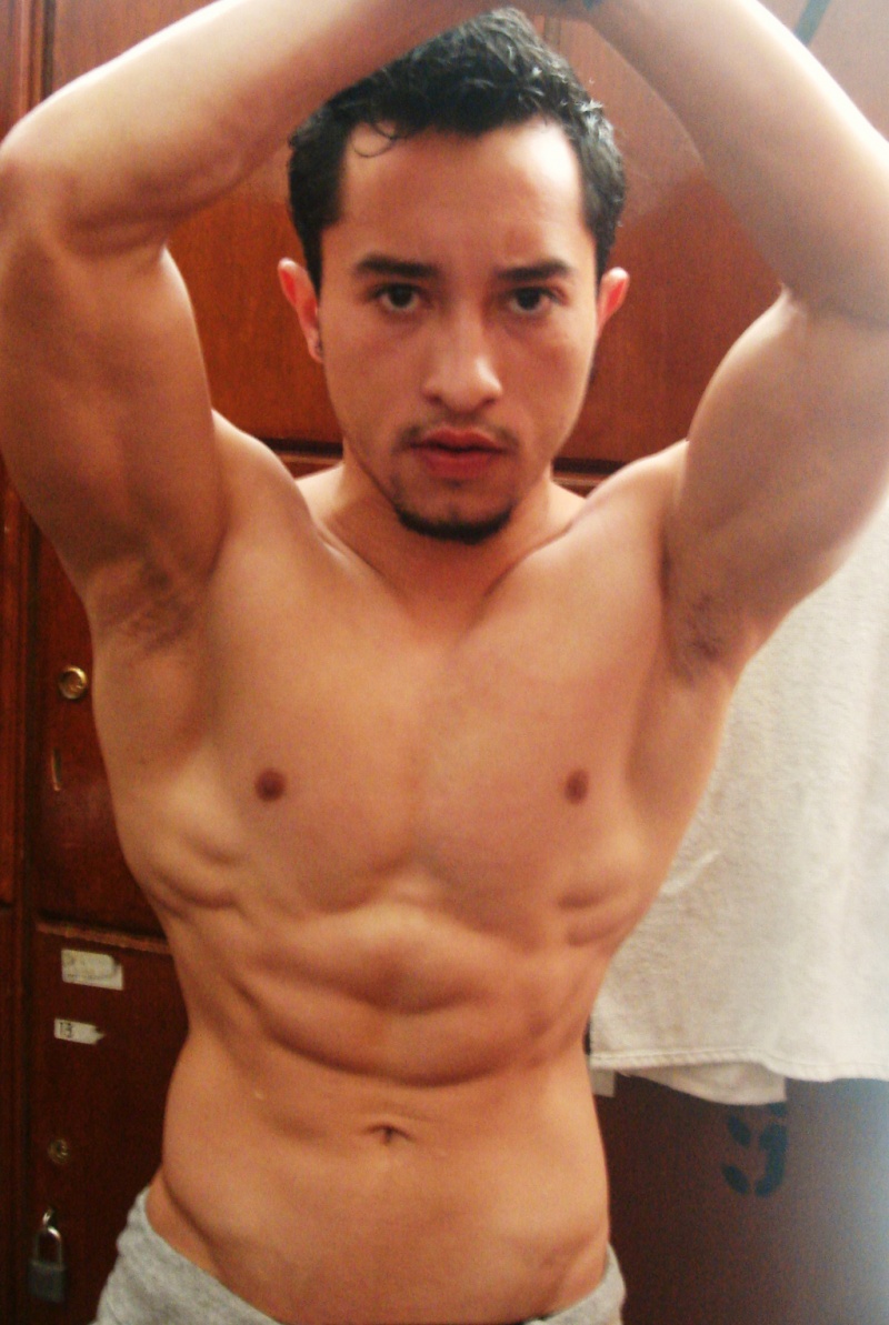 Male model photo shoot of Carlos Yee in neo gym