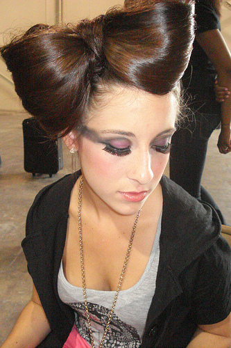 Female model photo shoot of Jessica Maloney in Mayday 2009 Fashion Show (Hair by paul mitchell student, makeup by MAC.)