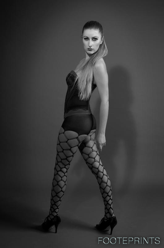 Female model photo shoot of Megan E C by FOOTE PRINTS in Studio