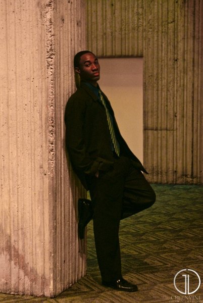 Male model photo shoot of King BI in Downtown Detroit