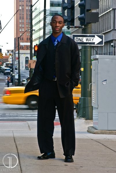 Male model photo shoot of King BI in Downtown Detroit
