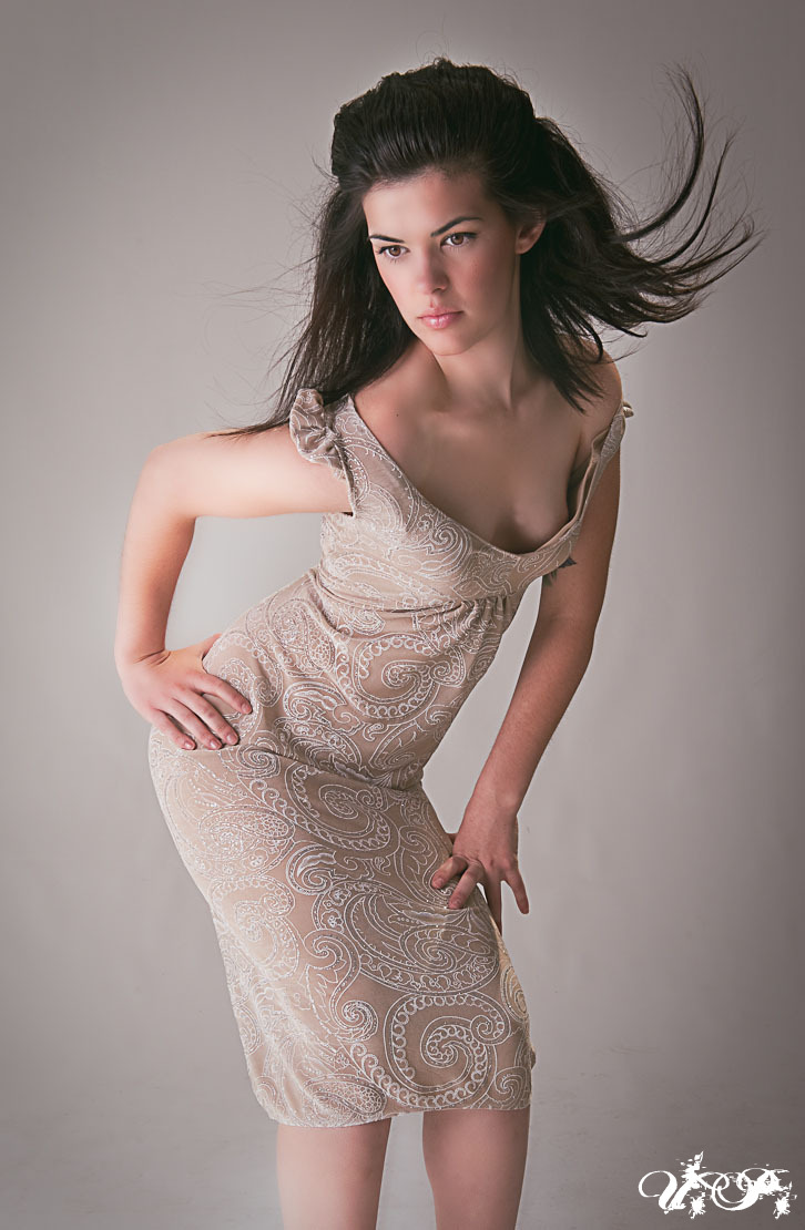 Female model photo shoot of Janelle Irene by felix martin, clothing designed by UNSUNGproductions
