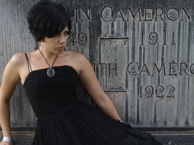 Female model photo shoot of Black Widow Art in Evergreen Cemetery, Tucson, Arizona