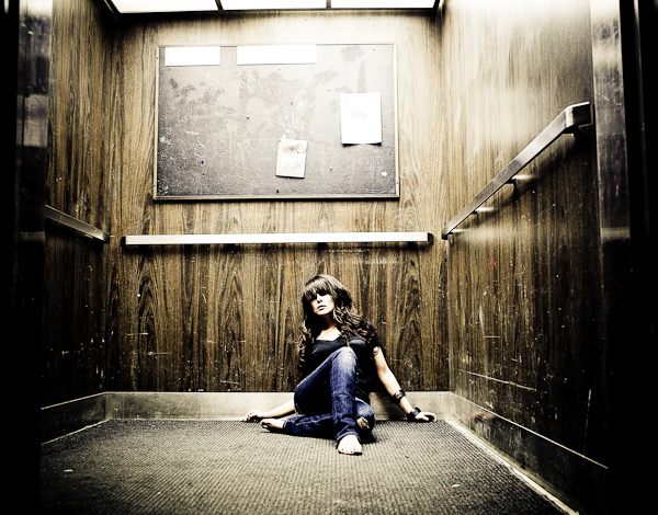 Female model photo shoot of Libby Lou by Josh Lewis Photography in An Elevator