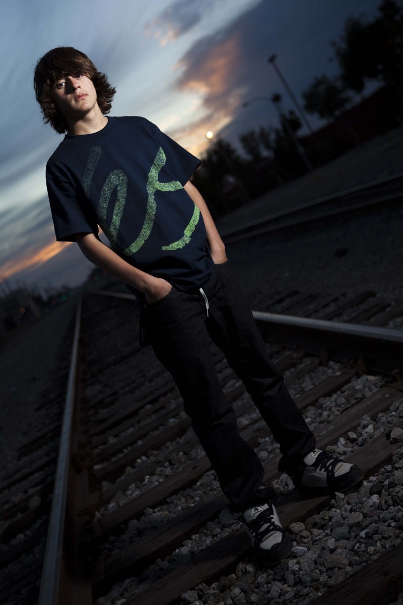 Male model photo shoot of Hernan Mojarro in Railroad tracks in South Gate