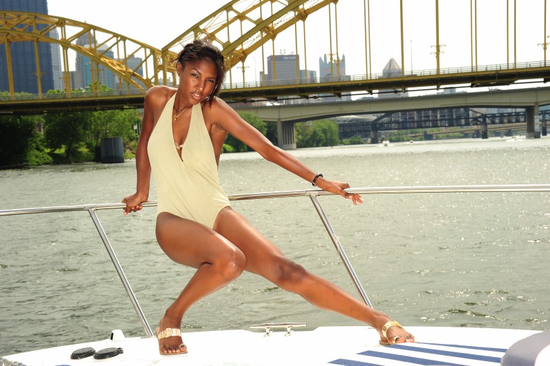 Female model photo shoot of Tasha Marie Bellaire in Friend's Boat