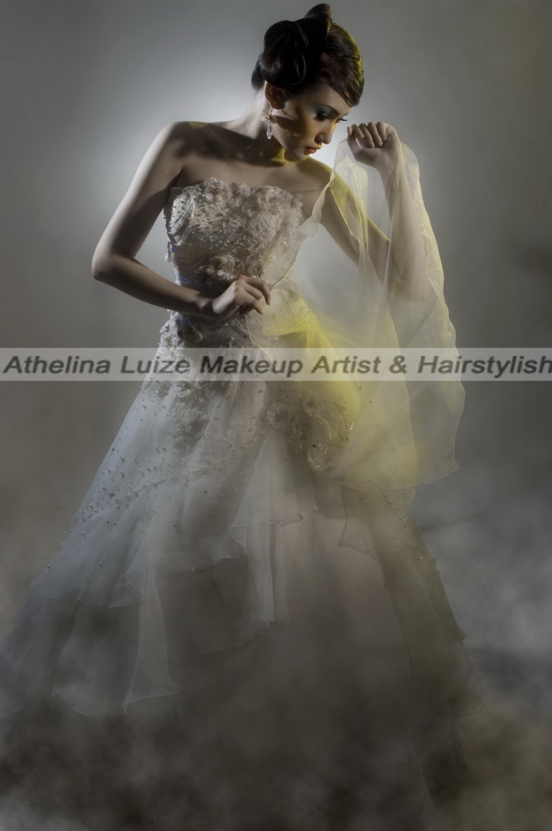 Female model photo shoot of Athelina Luize Makeup