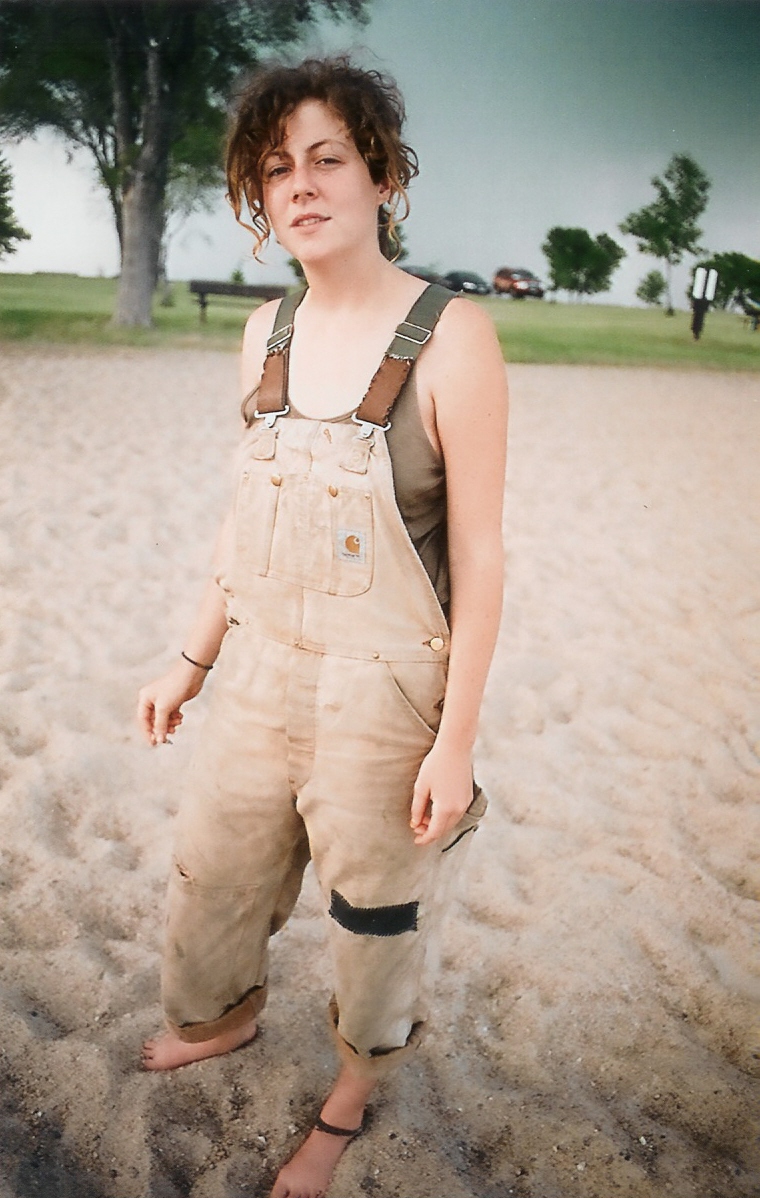 Female model photo shoot of Daryl Dietrich in lake in nebraska.