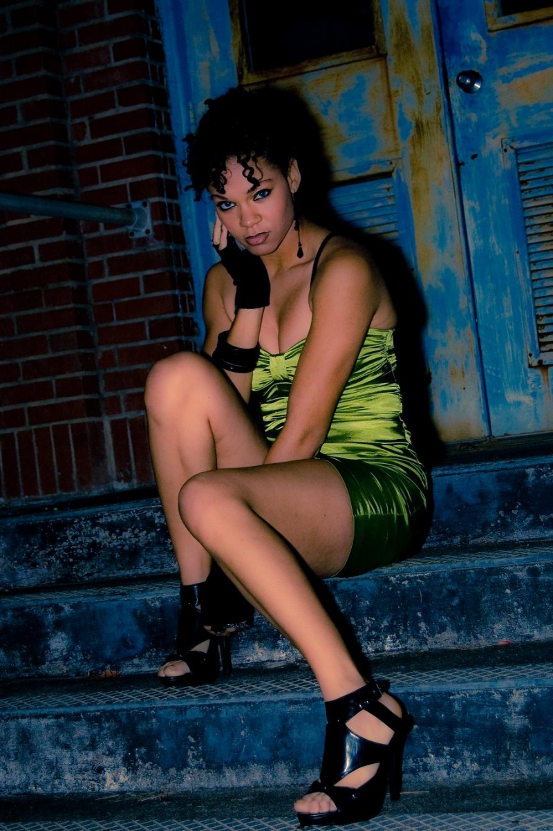 Female model photo shoot of Teiaki in Some dark street in Jacksoneville NC