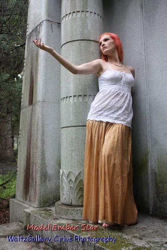 Male and Female model photo shoot of WaltzGallery OutReech and Ember Star in Evergreen Cemetery