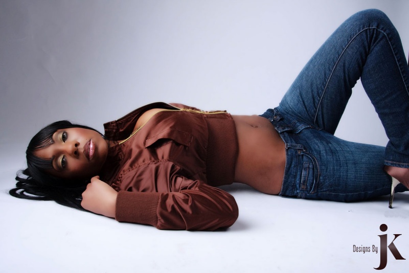 Female model photo shoot of ChaVaughn N by Designs By JK, makeup by Blu Artistry